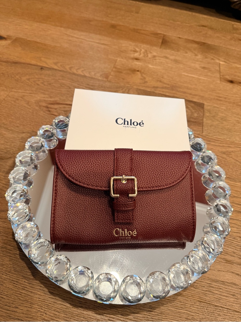 Chloé Burgundy Pebbled Leather Wallet with Gold Buckle